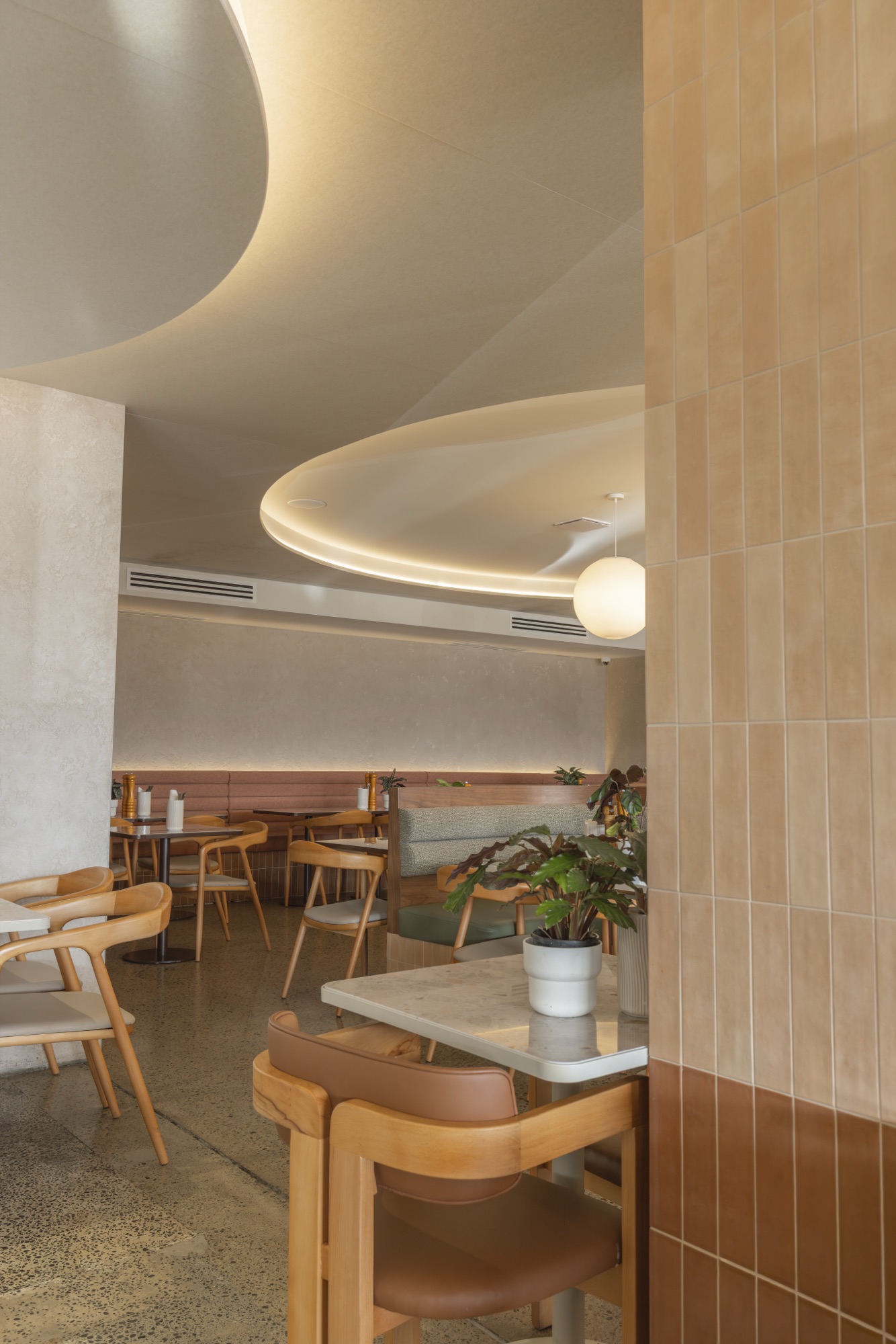 Interior with peach and brown tile column