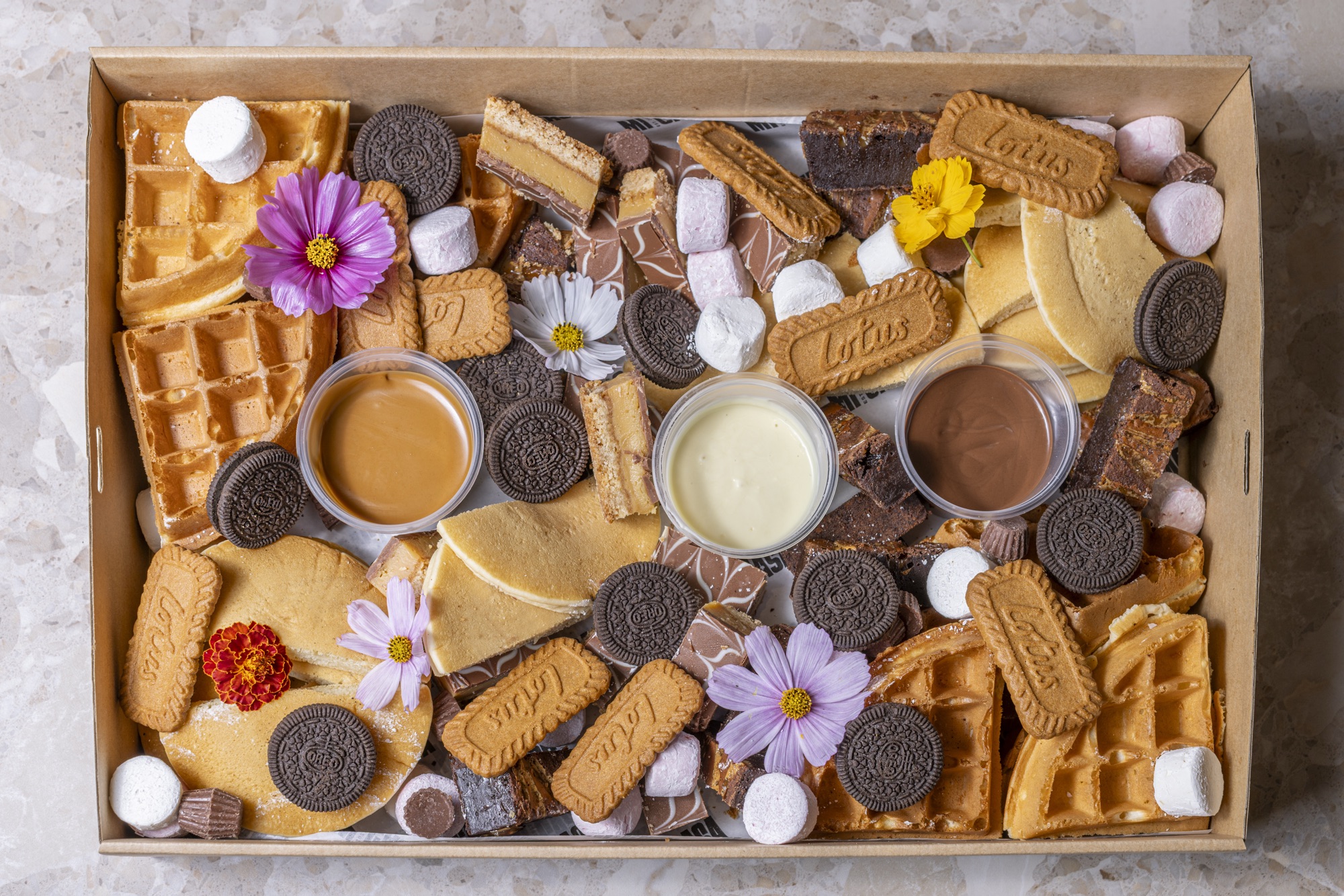 Dessert Box with waffles biscoff oreos and dipping sauces